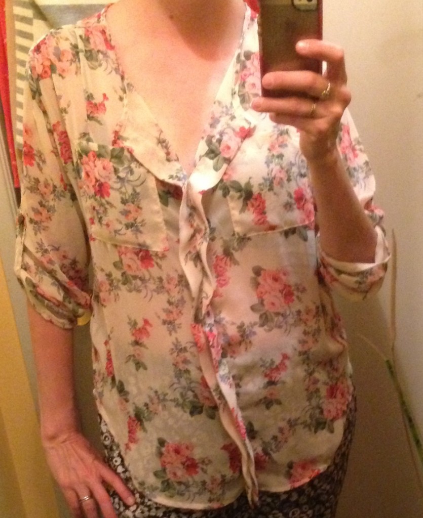 Floral blouse with interesting details $3.50