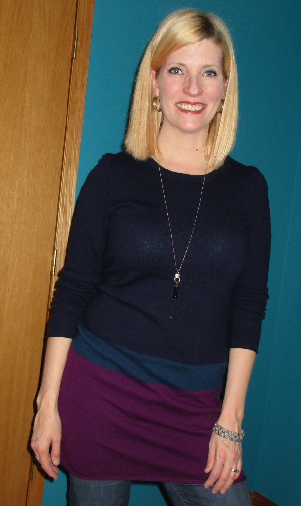 A simple pendant necklace will always work with your sweater dresses - it should go over the girls!  