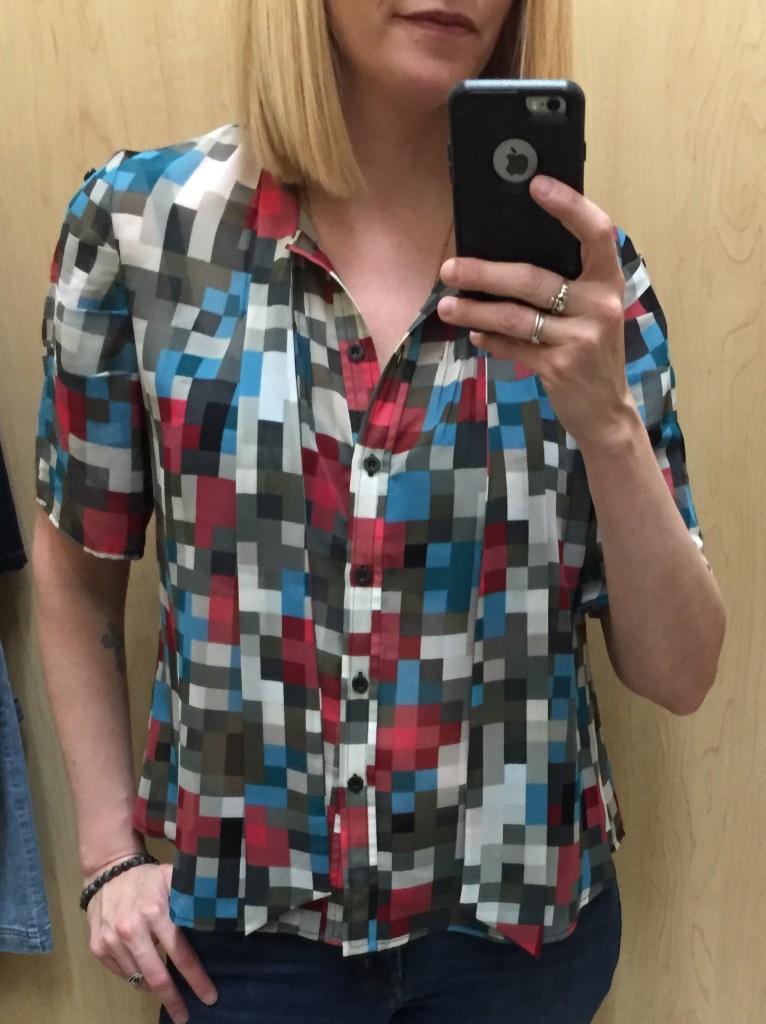 Liked the print on this blouse but the length was a bit short...