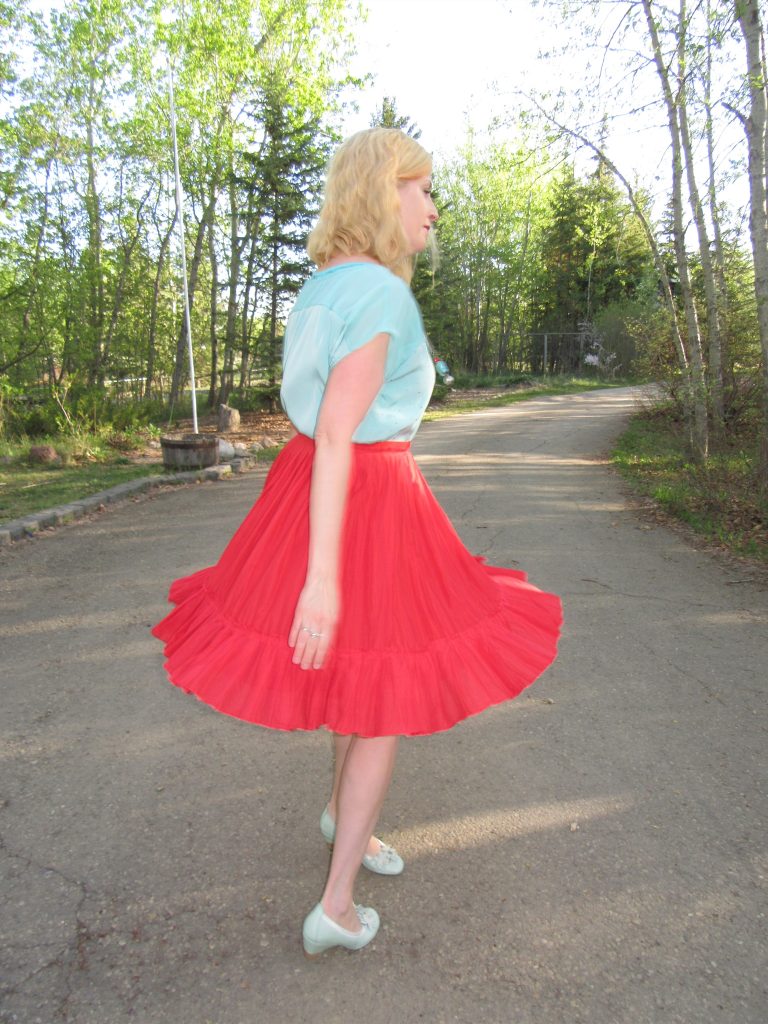 Karlynn takes her Pyrex for a whirl; I take my skirt for a twirl.