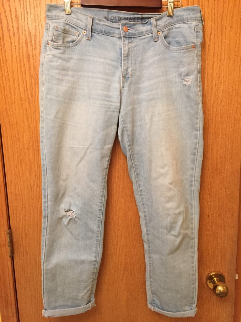 MORE because these were light wash, which I've been looking for, and they were super comfy and only $2.50!!  I did make one little alteration... There was quite a bit of fraying around the distressed areas which just seemed, er, bushy and er, unkempt.  So I trimmed them up.  :D  