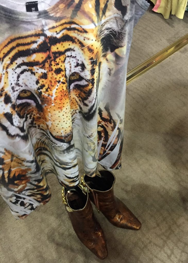 Jaime loves all things animal print, and this casual tank would look great with any kind of denim and those boots!