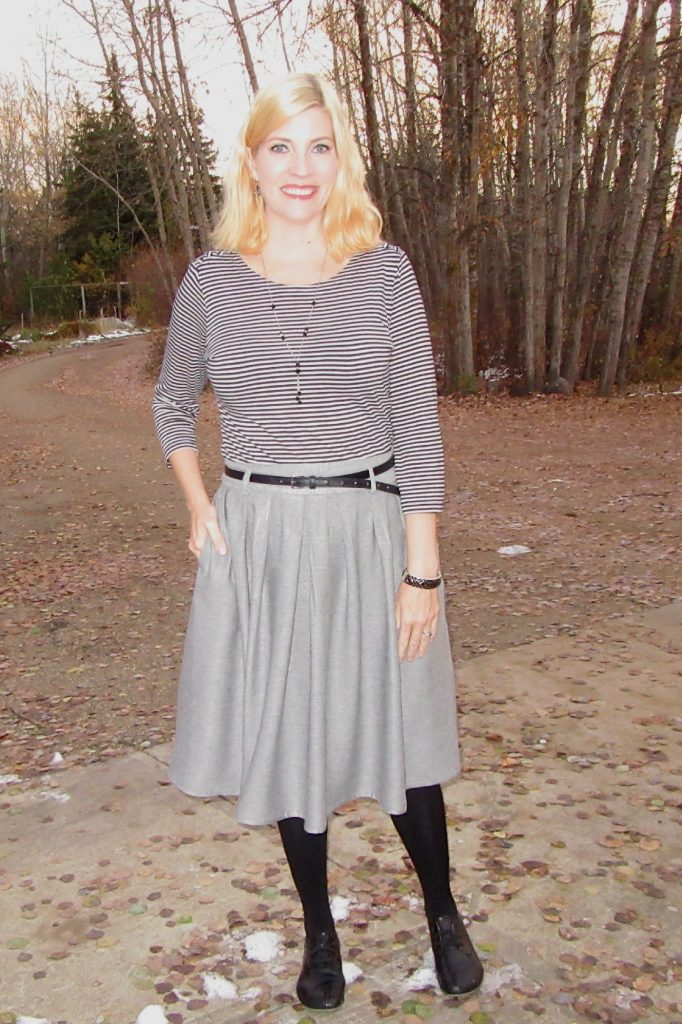 Worn with my $2.45 striped top, $3.50 black belt, tights and accessories from my closet. 